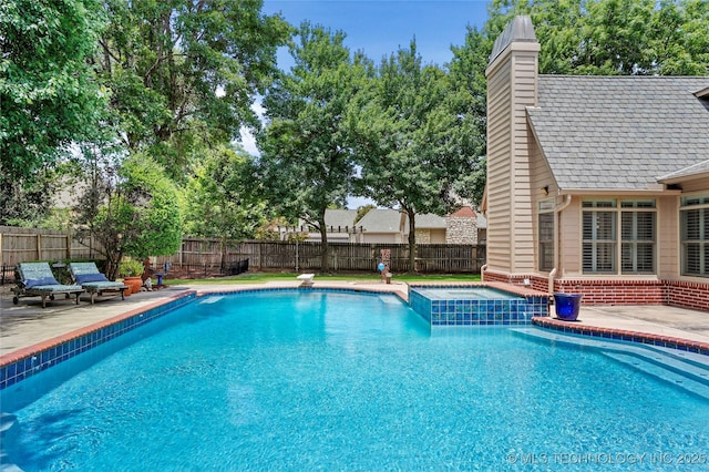 10150 S Maplewood Ave, Tulsa, OK 74137 - view of pool with a patio area, a fenced backyard, and a pool with connected hot tub