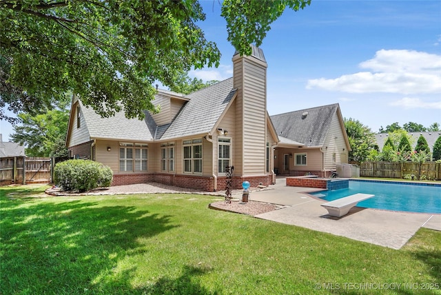 10150 S Maplewood Ave, Tulsa, OK 74137 - rear view of property featuring a patio, a fenced backyard, brick siding, a chimney, and a gate