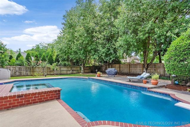 10150 S Maplewood Ave, Tulsa, OK 74137 - view of pool with an in-ground hot tub and a fenced backyard