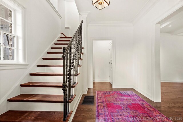 1111 E 24th Pl, Tulsa, OK 74114 - stairs featuring plenty of natural light, wood finished floors, and crown molding