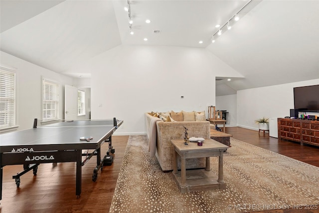 1111 E 24th Pl, Tulsa, OK 74114 - playroom featuring vaulted ceiling, rail lighting, and wood finished floors