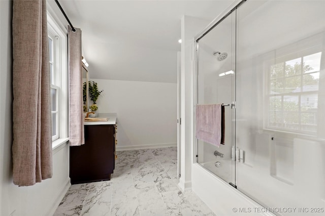 1111 E 24th Pl, Tulsa, OK 74114 - bathroom with vanity, enclosed tub / shower combo, marble look tiles, and plenty of natural light