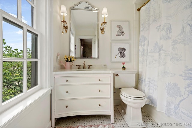 1111 E 24th Pl, Tulsa, OK 74114 - bathroom featuring healthy amount of natural light, vanity, and curtained shower