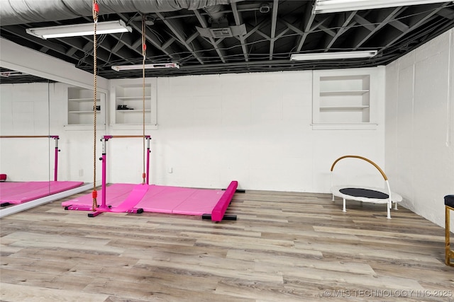 1111 E 24th Pl, Tulsa, OK 74114 - exercise area with wood finished floors