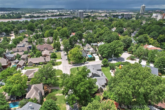 1111 E 24th Pl, Tulsa, OK 74114 - aerial perspective of suburban area featuring a nearby body of water