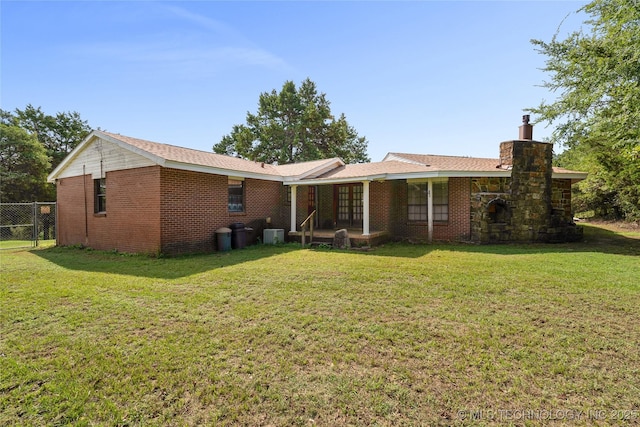 39827 Morris Creek Rd, Howe, OK 74940 - back of property featuring a chimney and brick siding