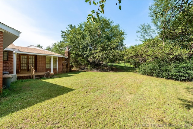 39827 Morris Creek Rd, Howe, OK 74940 - view of grassy yard featuring french doors