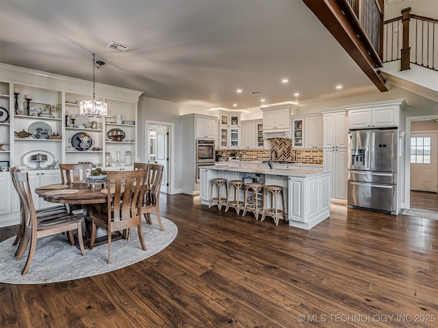 20853 S 81st Ave W, Mounds, OK 74047 - dining space with a chandelier, dark wood-type flooring, and recessed lighting