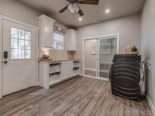 20853 S 81st Ave W, Mounds, OK 74047 - home office featuring washer / clothes dryer, wood finished floors, ceiling fan, and recessed lighting