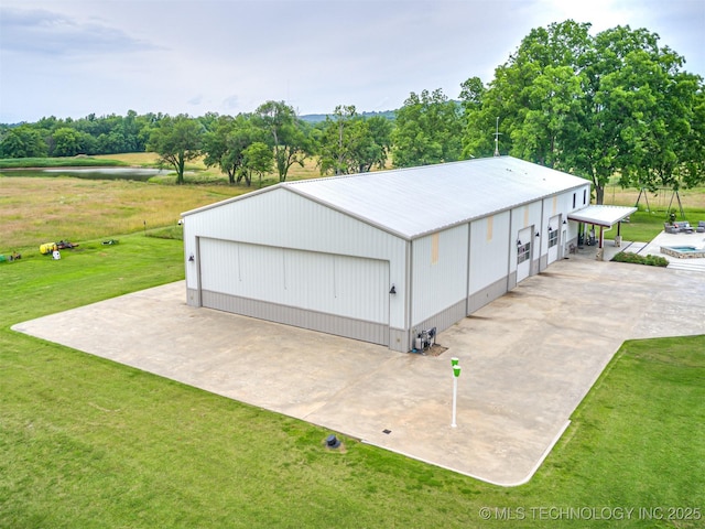 20853 S 81st Ave W, Mounds, OK 74047 - detached garage featuring view of scattered trees
