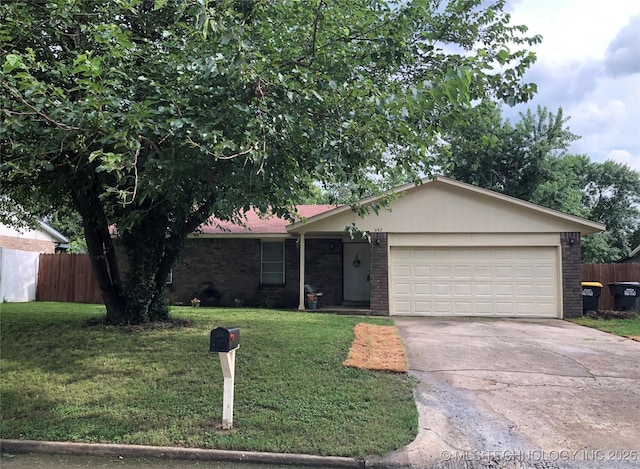 642 E 138th Pl, Glenpool, OK 74033 - single story home featuring brick siding, a garage, and driveway