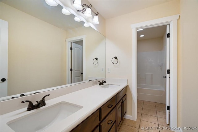 16511 S 4230th Rd, Claremore, OK 74017 - bathroom with tile patterned flooring, double vanity, and shower / tub combination
