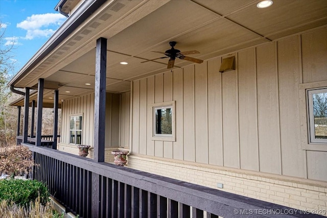 16511 S 4230th Rd, Claremore, OK 74017 - view of side of property featuring ceiling fan, board and batten siding, and brick siding