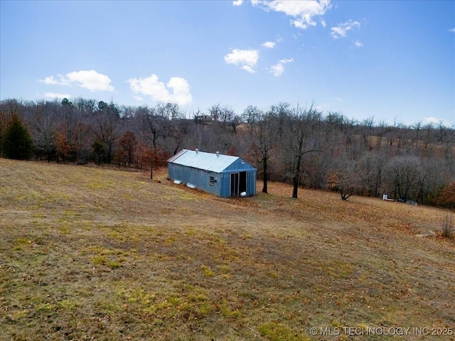 16511 S 4230th Rd, Claremore, OK 74017 - view of yard with a pole building, an outbuilding, a view of trees, and a view of countryside