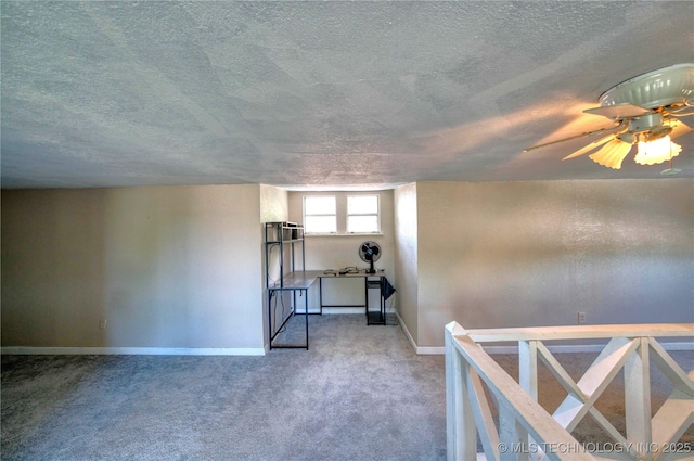 919 S 2nd St, Mcalester, OK 74501 - spare room with carpet, a textured ceiling, and a ceiling fan