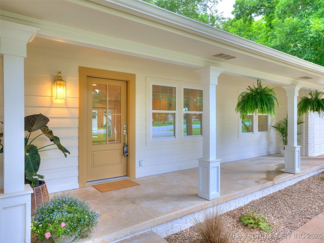 11702 S 75th E Ave, Bixby, OK 74008 - doorway to property with a porch