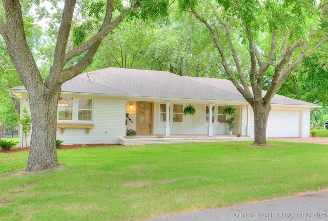 11702 S 75th E Ave, Bixby, OK 74008 - ranch-style home with an attached garage, covered porch, a front lawn, and brick siding