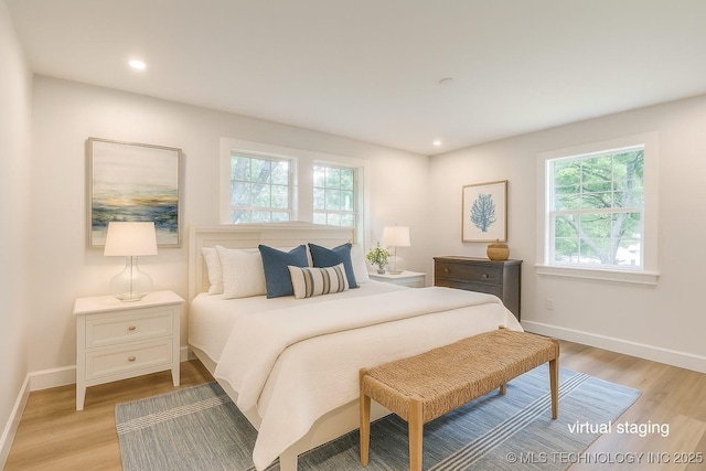 11702 S 75th E Ave, Bixby, OK 74008 - bedroom featuring light wood finished floors and recessed lighting