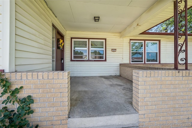 503 N Prairie Ave, Okmulgee, OK 74447 - doorway to property with covered porch