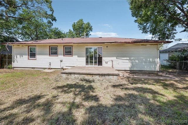 503 N Prairie Ave, Okmulgee, OK 74447 - rear view of house featuring a patio and crawl space