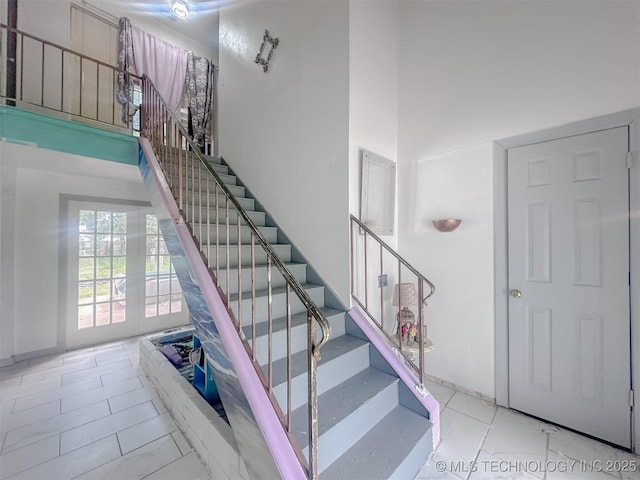 3203 S 101st E Pl, Tulsa, OK 74146 - stairway with a towering ceiling