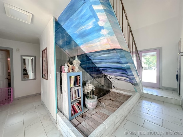 3203 S 101st E Pl, Tulsa, OK 74146 - hallway featuring attic access, stairs, and marble finish floors