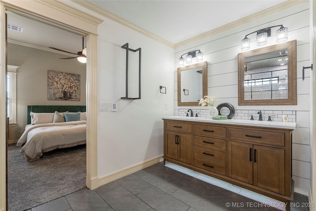 7180 E 179th St S, Bixby, OK 74008 - ensuite bathroom with tile patterned flooring, double vanity, tasteful backsplash, ornamental molding, and a ceiling fan