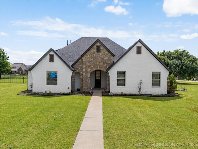 7180 E 179th St S, Bixby, OK 74008 - french country style house featuring stone siding and a shingled roof
