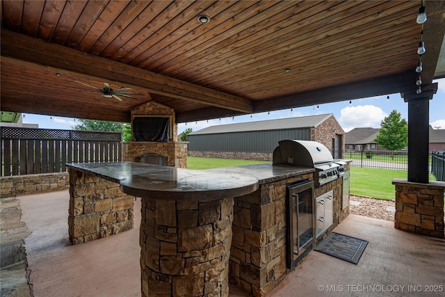 7180 E 179th St S, Bixby, OK 74008 - fenced backyard featuring area for grilling, beverage cooler, a patio, and ceiling fan