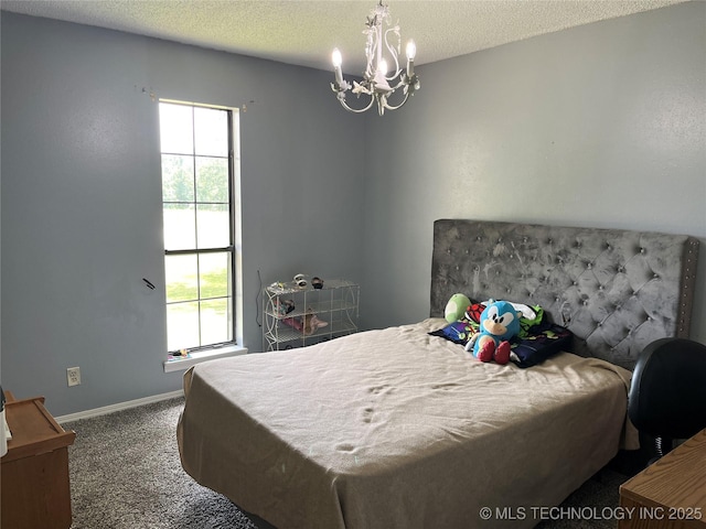 465385 E 981st Rd, Sallisaw, OK 74955 - bedroom with multiple windows, a chandelier, carpet flooring, and a textured ceiling
