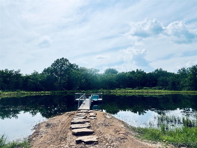 416602 E 1065, Checotah, OK 74426 - dock area with a water view and a view of trees