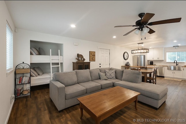 416602 E 1065, Checotah, OK 74426 - living area featuring a ceiling fan, dark wood-style flooring, and recessed lighting