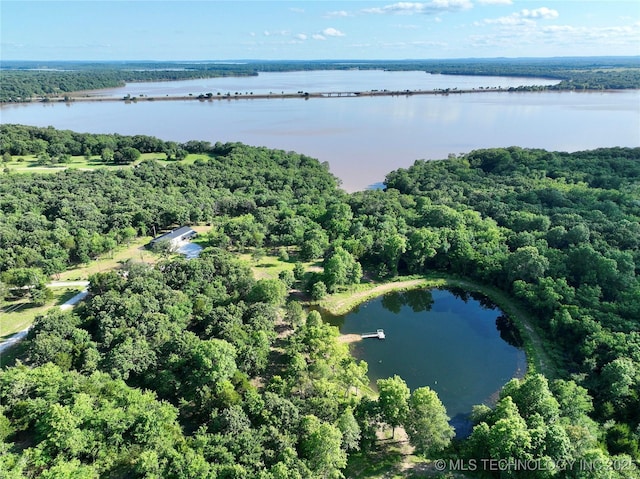 416602 E 1065, Checotah, OK 74426 - view of property location with a nearby body of water and a heavily wooded area
