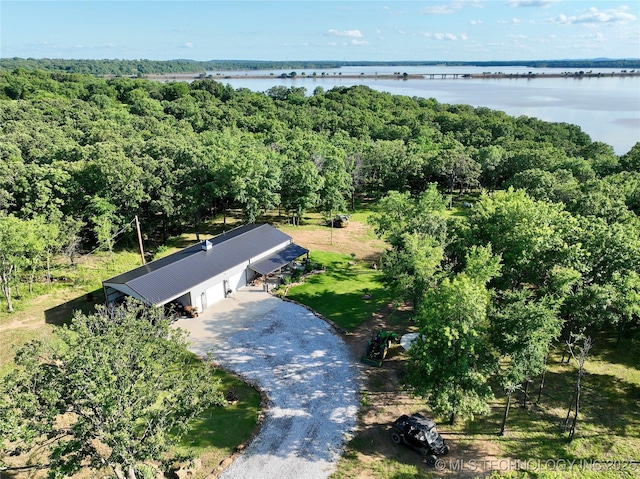 416602 E 1065, Checotah, OK 74426 - aerial view of property and surrounding area with a nearby body of water and a forest