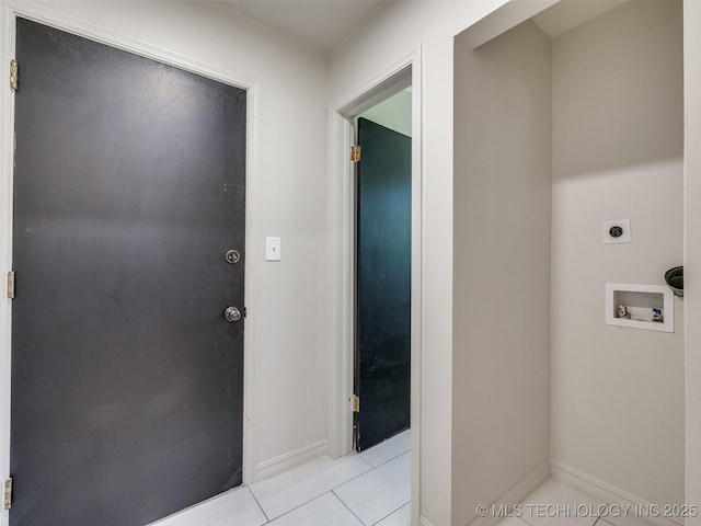 701 W 41st St, Sand Springs, OK 74063 - washroom featuring washer hookup, light tile patterned floors, and hookup for an electric dryer