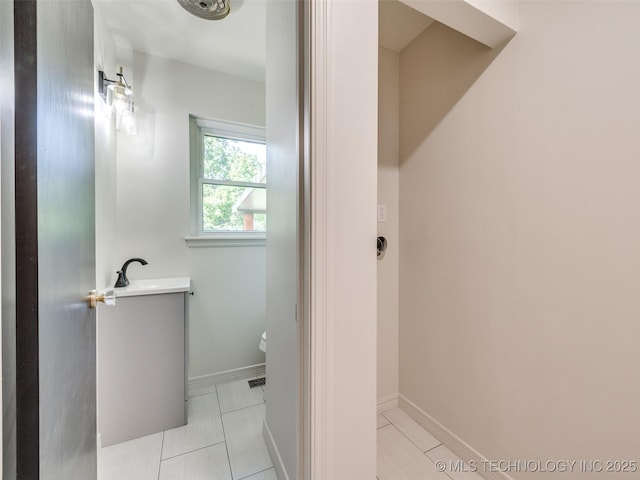 701 W 41st St, Sand Springs, OK 74063 - bathroom featuring vanity and tile patterned floors