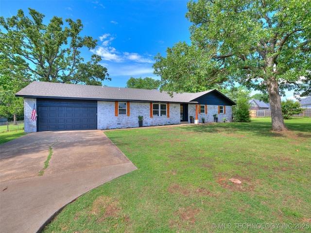 701 W 41st St, Sand Springs, OK 74063 - ranch-style home featuring a garage, driveway, and brick siding