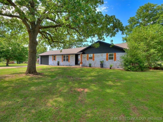 701 W 41st St, Sand Springs, OK 74063 - ranch-style home with an attached garage and a front yard