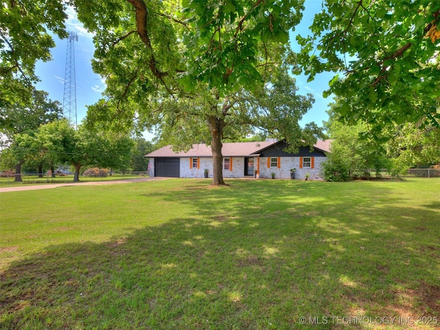 701 W 41st St, Sand Springs, OK 74063 - ranch-style home with stone siding, a front yard, and a garage