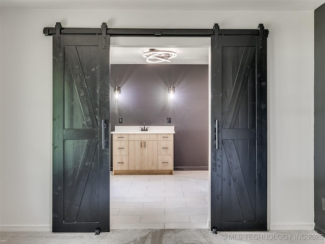 701 W 41st St, Sand Springs, OK 74063 - bathroom with vanity and baseboards