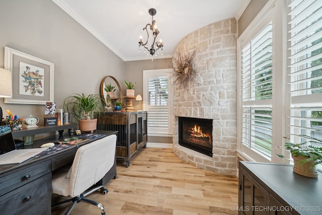6140 E 140th St S, Bixby, OK 74008 - office space featuring light wood-style floors, ornamental molding, a fireplace, and a chandelier