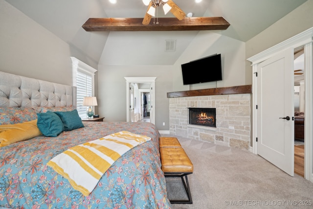 6140 E 140th St S, Bixby, OK 74008 - bedroom featuring a stone fireplace, carpet flooring, and a ceiling fan