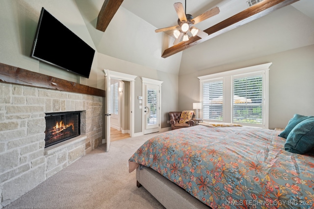 6140 E 140th St S, Bixby, OK 74008 - carpeted bedroom featuring a stone fireplace and a ceiling fan