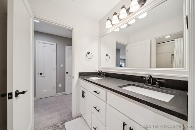 6140 E 140th St S, Bixby, OK 74008 - bathroom with double vanity and baseboards