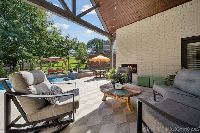 6140 E 140th St S, Bixby, OK 74008 - view of patio / terrace with an outdoor living space with a fireplace, an outdoor pool, and an in-ground hot tub