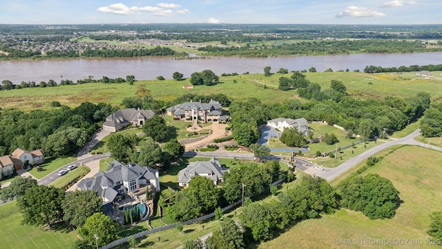 6140 E 140th St S, Bixby, OK 74008 - aerial view of property's location with a large body of water and nearby suburban area