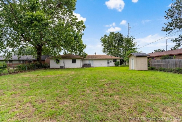 1706 S Madison Blvd, Bartlesville, OK 74006 - fenced backyard featuring a shed