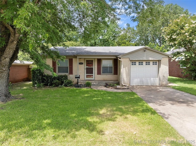 1809 Robison, Ardmore, OK 73401 - ranch-style home with brick siding, an attached garage, driveway, and a front yard