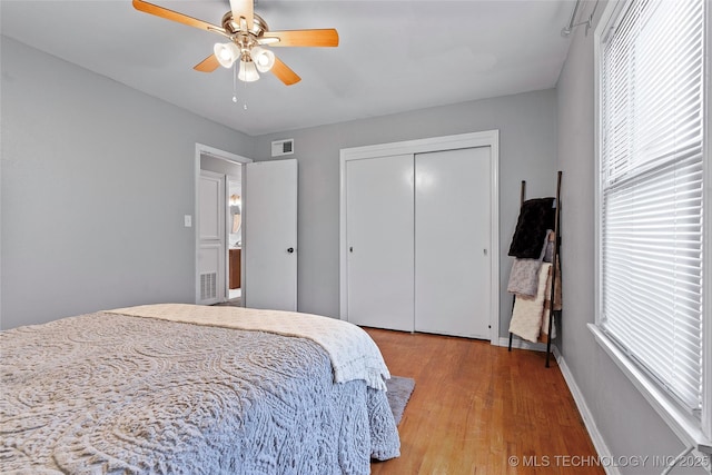 1809 Robison, Ardmore, OK 73401 - bedroom featuring light wood-type flooring, a closet, and a ceiling fan