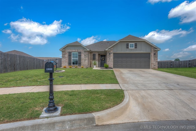 13009 E 124th Ct, Collinsville, OK 74021 - view of front of property featuring board and batten siding, concrete driveway, an attached garage, and brick siding